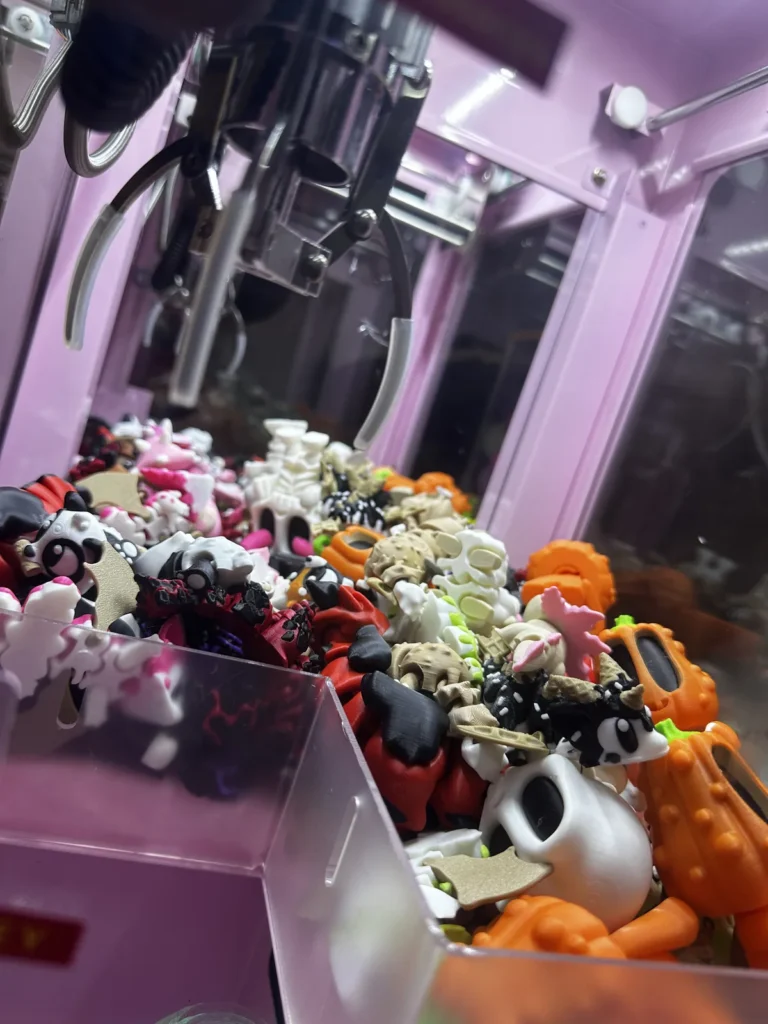 Claw machine filled with 3D printed prizes